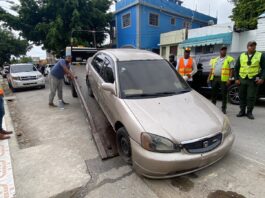 Retiran de las calles en San Pedro de Macoris vehículos mal estacionados y abandonados