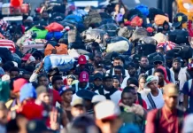 Migrantes haitianos protestan por sus condiciones