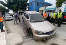 Retiran de las calles en San Pedro de Macoris vehículos mal estacionados y abandonados