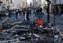 Francia impone toques de queda en París y otras ciudades tras disturbios y saqueos